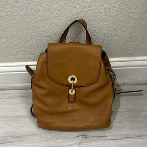 EUC Michael Kors Tan Brown backpack.  Lots of space and zippers.  Comfy to wear
